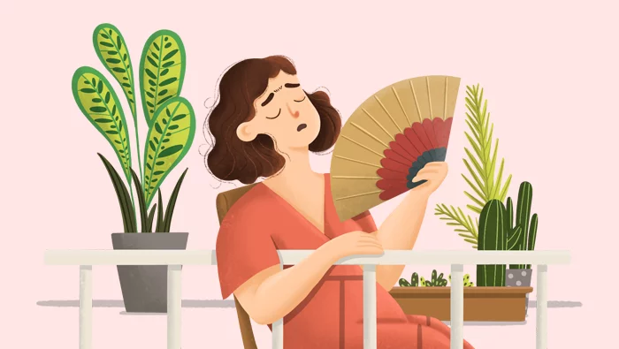 Ilustración de una mujer con sofocos debido a la perimenopausia